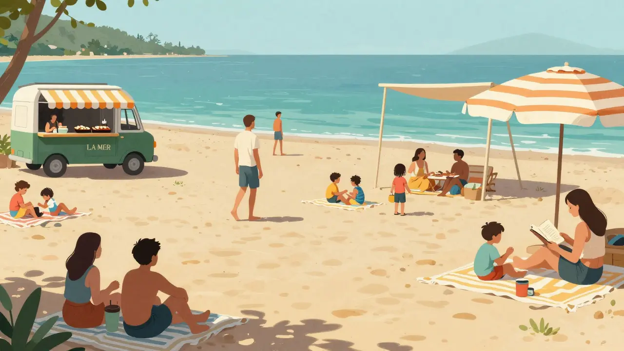 Families enjoying a relaxed day at La Mer Beach Club with food trucks and children playing nearby.